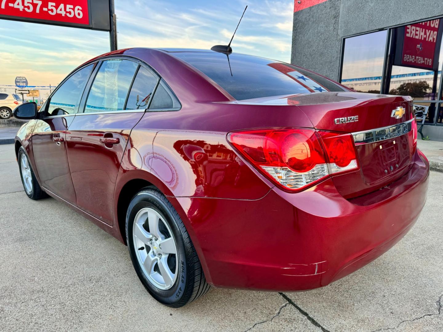 2016 RED /Gray CHEVROLET CRUZE LIMITED 1LT 1LT Auto 4dr Sedan w/1SD (1G1PE5SB1G7) with an 1.4L I4 Turbocharger engine, Automatic 6-Speed transmission, located at 5900 E. Lancaster Ave., Fort Worth, TX, 76112, (817) 457-5456, 0.000000, 0.000000 - This is a 2016 Chevrolet Cruze Limited 1LT Auto 4dr Sedan w/1SD that is in excellent condition. There are no dents or scratches. The interior is clean with no rips or tears or stains. All power windows, door locks and seats. Ice cold AC for those hot Texas summer days. It is equipped with a CD playe - Photo#4